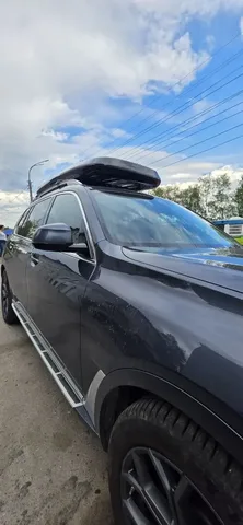 ENROAD Nomadix Pro XXL Slim 450-E на BMW X7 — крупный план автобокса и креплений