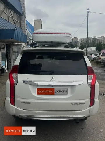 ENROAD Nomadix Pro XL Slim 400-E на Mitsubishi Pajero Sport — дополнительный ракурс автомобиля с установленным автобоксом